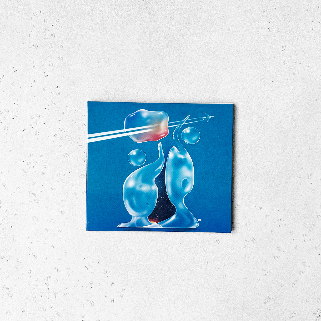 debut album CD depicting a blue cover and tripy space art